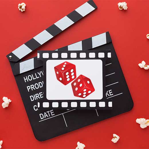 Movie track, popcorns, and two dice