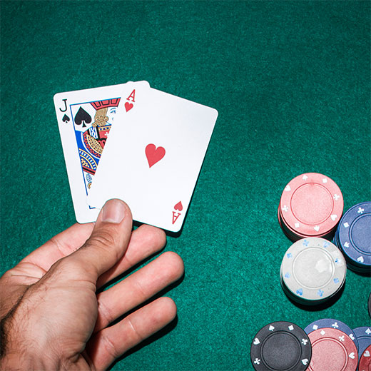 Man playing blackjack on the blackjack table
