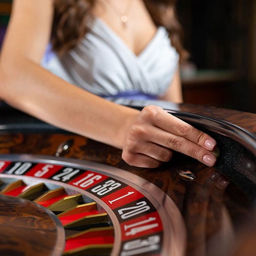 Spinning the ball on roulette wheel