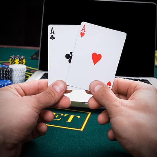 Gambler holding cards
