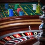 Roulette table and wheel