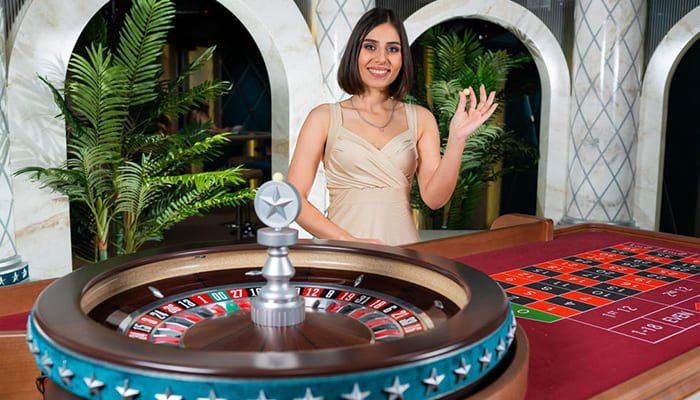 American Roulette wheel with host of the game